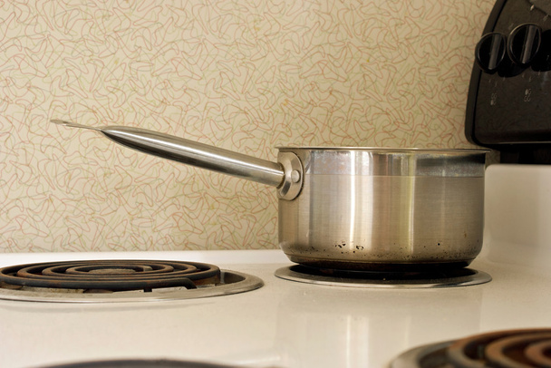 Pan on old stove - Photo, Image
