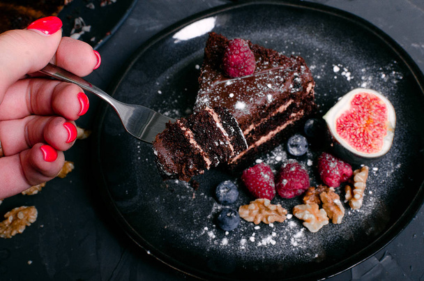 chocolate cake with fresh berries and nuts - Photo, image
