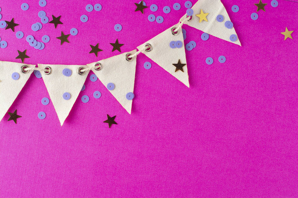 Flag triangular decorativ, party garland over colorful pink background. Christmas party, birthday mockup with copy space. - Фото, зображення
