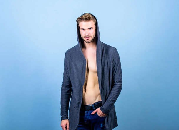 Brute masculinity extremely commanding looking conventionally handsome. Man well groomed handsome hooded clothes. Unconventional but masculine look. Masculinity concept. Masculinity and confidence - Fotografie, Obrázek