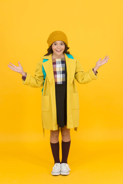 Aesthetics of clothes. Fall outfit. Modern teen outfit concept. Outfit for daily school life. Feeling cool and stylish. Fall fashion. Little girl wearing stylish hat and coat. Schoolgirl fancy child - Photo, image