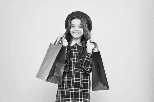 Black friday. Sale discount. Shopping day. Child hold package. Favorite kids brand. Girl with shopping bag. Save money. Live better. Rediscover great shopping tradition. Shopping and purchase - Foto, Bild