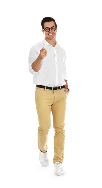 Professional business trainer pointing on something, white background - Photo, Image