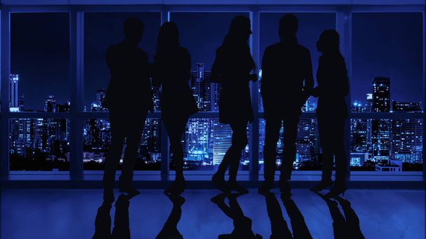 zakelijke achtergrond van silhouet van zakenmensen staan om - Foto, afbeelding