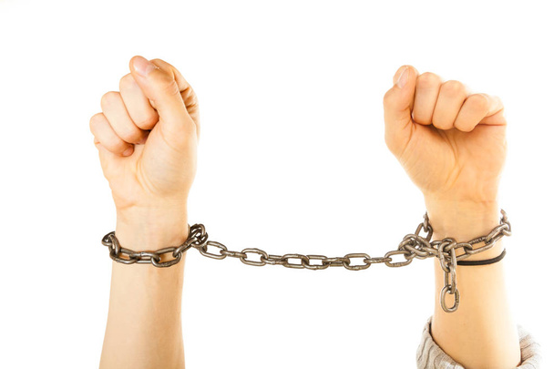 Chained man hands with chain around wrists - Photo, Image
