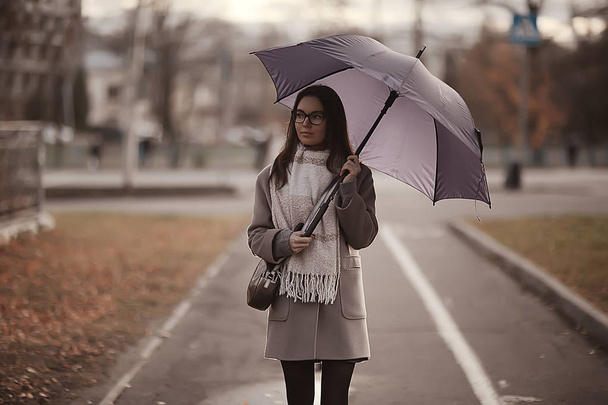 young woman umbrella autumn / autumn trendy look, model with umbrella, rainy cold weather - Photo, image