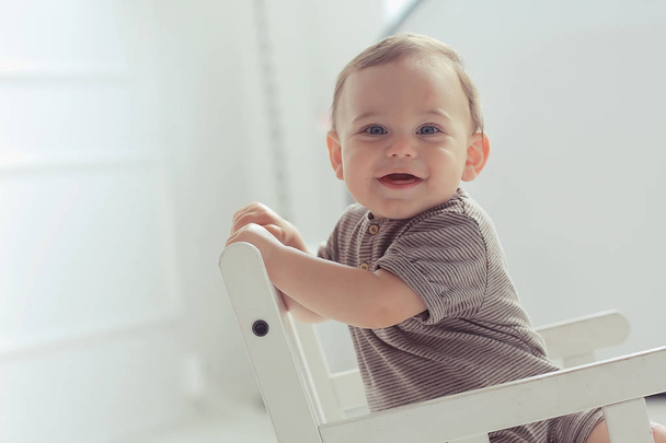 cheerful healthy baby smiling / portrait of a small child, boy little son cheerful health - Zdjęcie, obraz