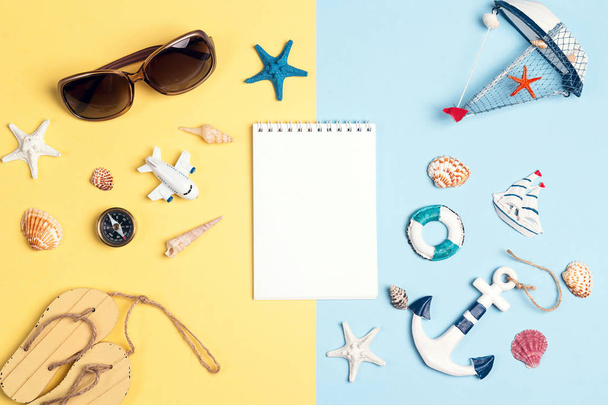 Flat lay travel concept with blank notebook, vacation accessorie - Fotografie, Obrázek