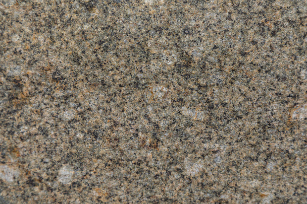 Top view of black and sandy color granite stone surface - Photo, Image