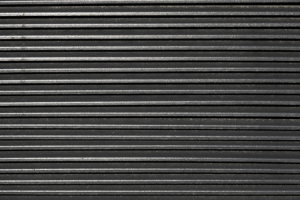 Elevated view of corrugated metal surface for blind people - Fotografie, Obrázek