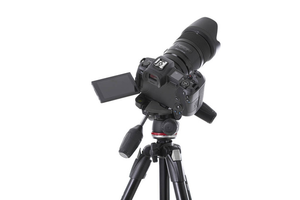 High angle view on massive black still-shot camera on holder isolated - Φωτογραφία, εικόνα