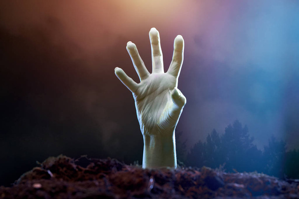 Image of zombie hand sticking out of grave - Zdjęcie, obraz