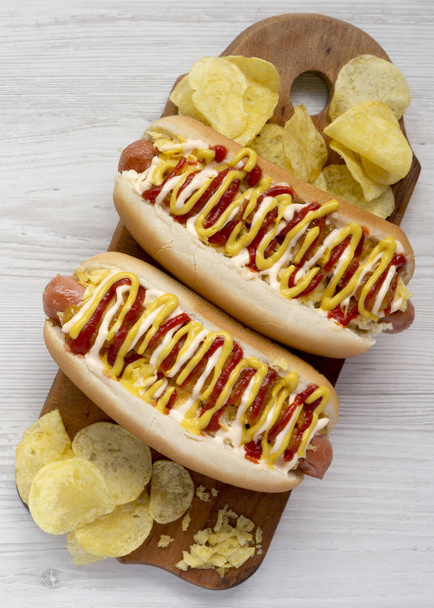 Top view, homemade colombian hot dogs with pineapple sauce, yell - Photo, Image