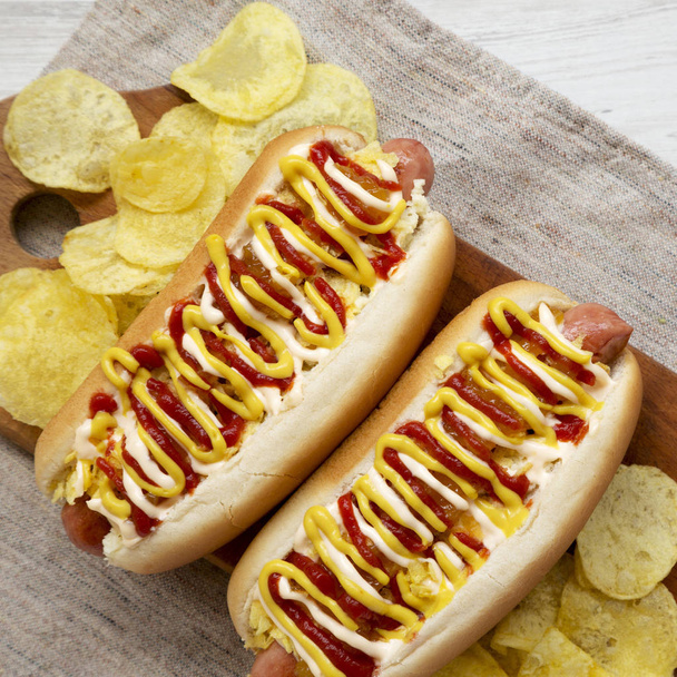 Tasty homemade colombian hot dogs with pineapple sauce, yellow m - Photo, Image
