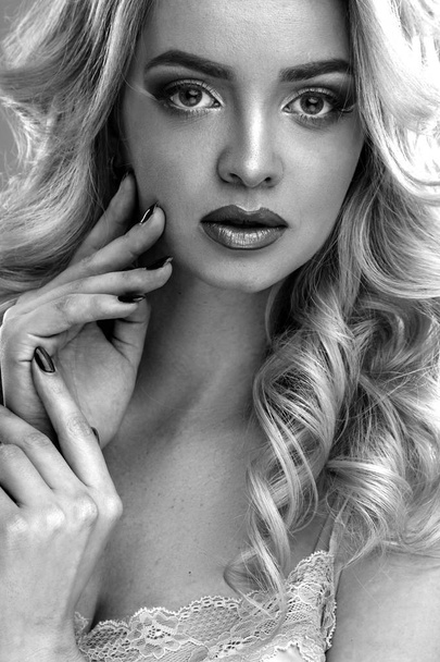 Beauty portrait of blonde beautiful woman with perfect makeup and hair style, isolated. Spa and hair, healthy skin - 写真・画像