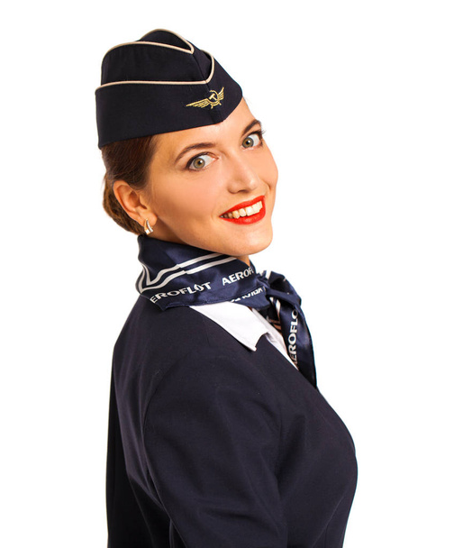RUSSIA, MOSCOW: 21 SEPTEMBER 2019. Beautiful stewardess dressed  - Zdjęcie, obraz