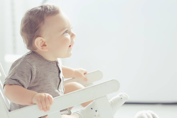 toddler child in a bright studio / little boy infant beautiful healthy child - Фото, зображення