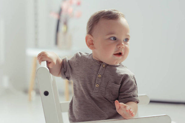 toddler child in a bright studio / little boy infant beautiful healthy child - Foto, Bild