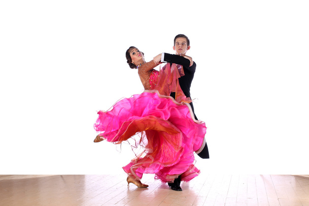 Latino dancers in ballroom - Фото, зображення