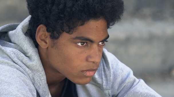 Unhealthy awkward age teen male coughing outdoor, homelessness and poverty - Filmagem, Vídeo