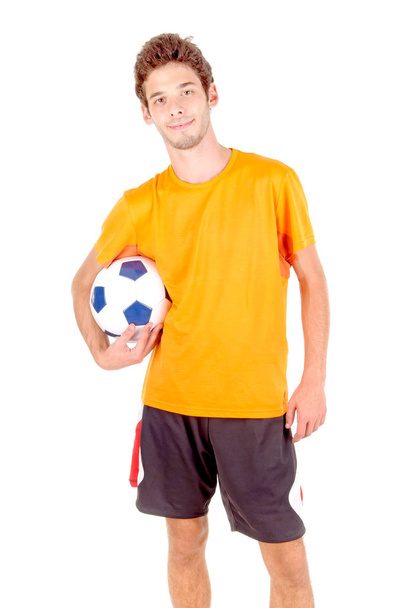 teenage boy with soccer ball isolated in white - 写真・画像