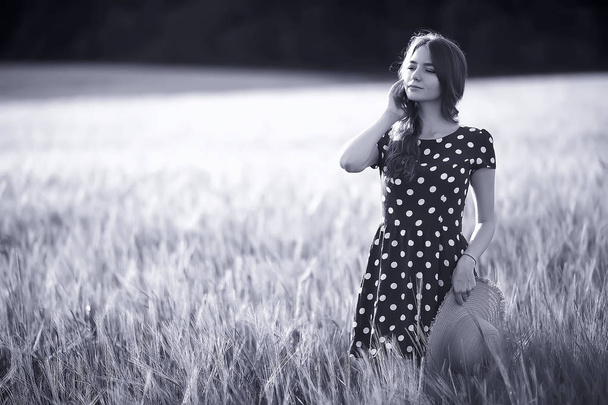 girl dress wheat field / happy summer vacation concept, one model in a sunny field - Foto, Imagen