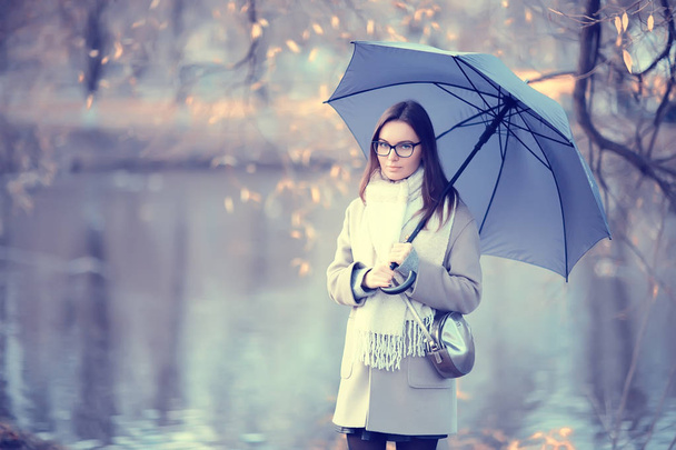 young woman umbrella autumn / autumn trendy look, model with umbrella, rainy cold weather - Foto, Imagem