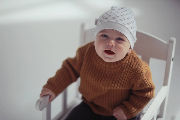 toddler child in a bright studio / little boy infant beautiful healthy child - Valokuva, kuva