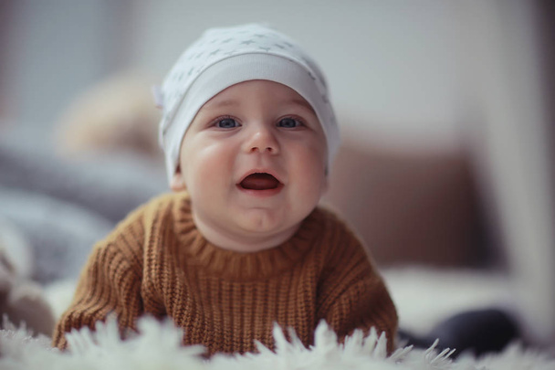 cheerful healthy baby smiling / portrait of a small child, boy little son cheerful health - Fotoğraf, Görsel