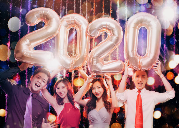 happy young group celebrating new year 2020 party - Photo, Image