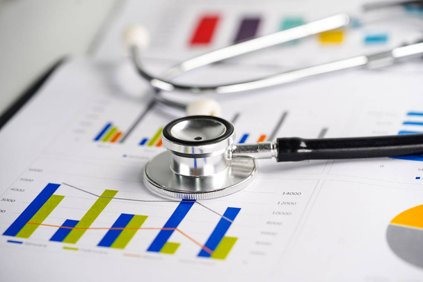 Stethoscope, Charts and Graphs spreadsheet paper, Finance, Account, Statistics, Investment, Analytic research data economy spreadsheet and Business company concept - Photo, Image