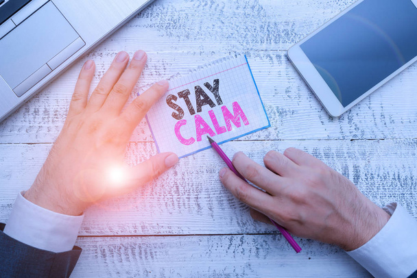 Writing note showing Stay Calm. Business photo showcasing Maintain in a state of motion smoothly even under pressure. - Photo, Image