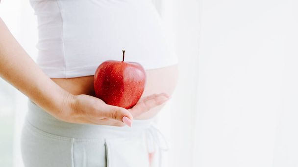 healthy nutrition organic fruit pregnant woman - Foto, afbeelding