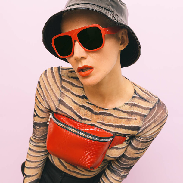 Fashion Swag Model. Stylish red accessories. Sunglasses, clutch  - 写真・画像