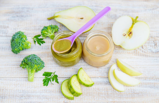 baby food in small jars. Selective focus. - Photo, image