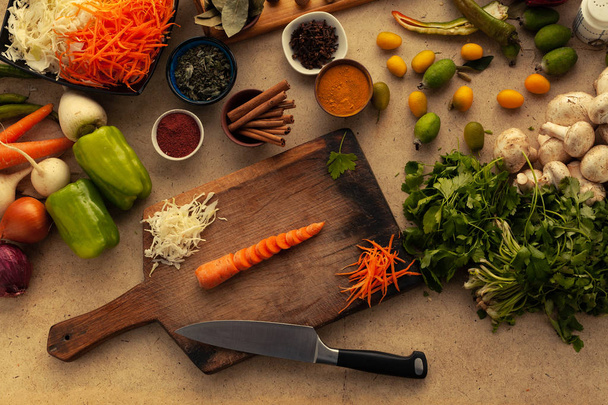Sliced carrot on cutting board prepared for cook. - Фото, зображення