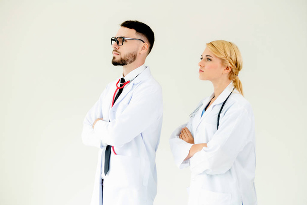 Confident doctors standing with arms crossed. - Photo, Image