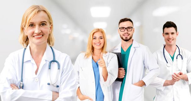 Professional doctor working in hospital office or clinic with other doctors, nurse and surgeon.  - Photo, image