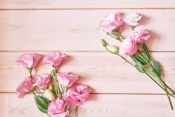 eustoma flowers on a pink background - Photo, Image