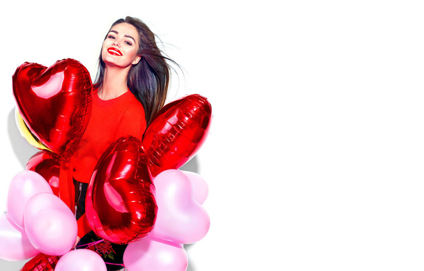 Valentine's Day. Beauty girl with colorful air balloons having f - Valokuva, kuva