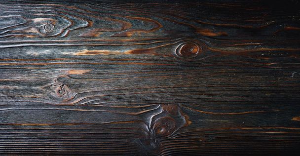 Dark wooden vintage background. Brown aged wood backdrop texture - Фото, изображение