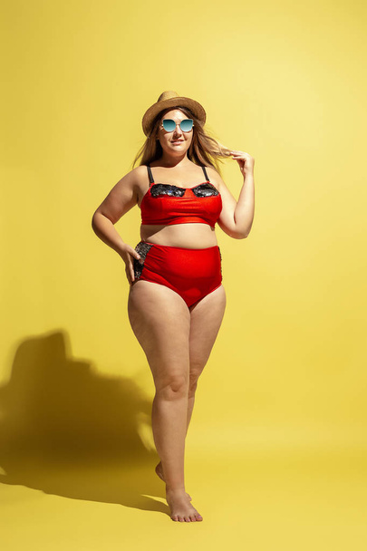Young caucasian plus size female models preparing for beach resort - Valokuva, kuva