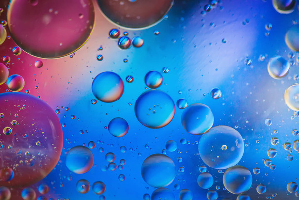 Multicolored abstract defocused background picture made with oil, water and soap - Fotoğraf, Görsel
