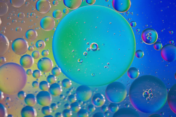 Rainbow abstract defocused background picture made with oil, water and soap - Foto, Imagen