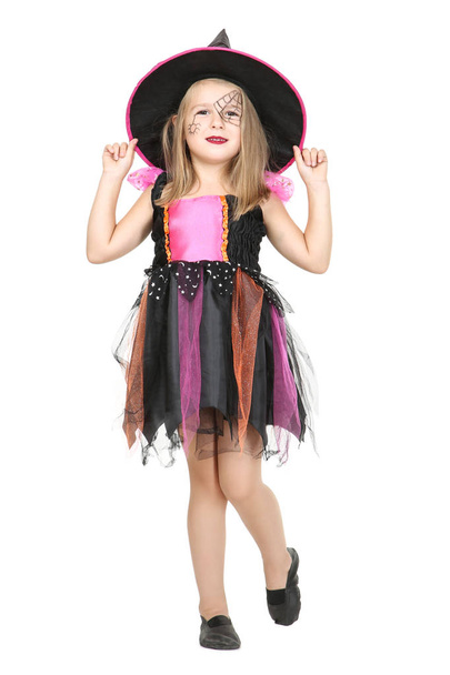 Young girl in halloween costume on white background - 写真・画像