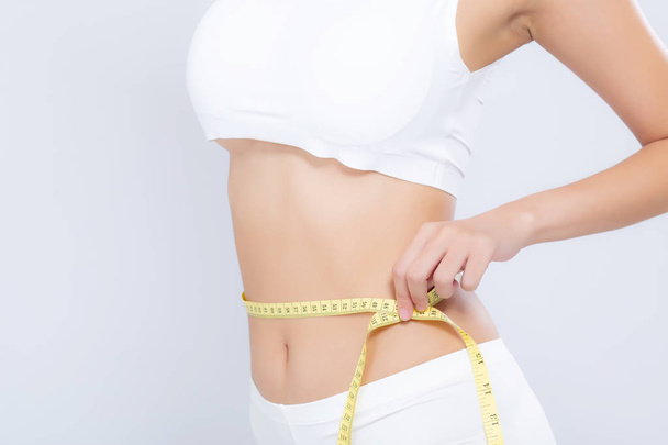 Asian woman diet and slim with measuring waist for weight isolat - Φωτογραφία, εικόνα