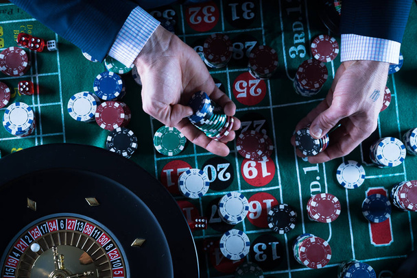 Casino - man playing gambling games concept. - Фото, изображение