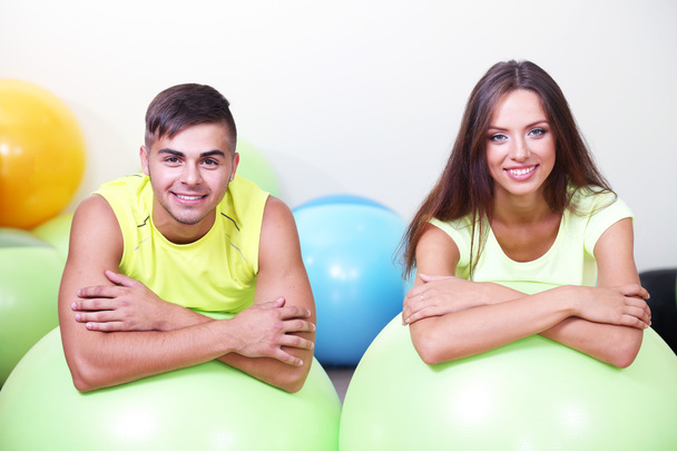 Girl and guy in fitness room - Foto, Imagem