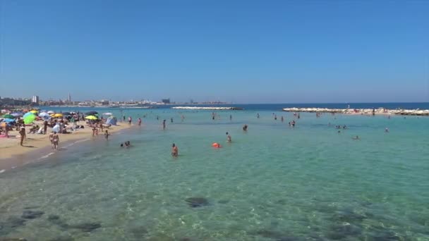 Italy, Bari, view of people on the beach - Footage, Video