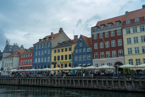 COPENHAGEN, DENMARK, AUGUST,15, 2019: Image of the Nyhavn canal or New Harbour is waterfront district in Copenhagen. - Fotó, kép
